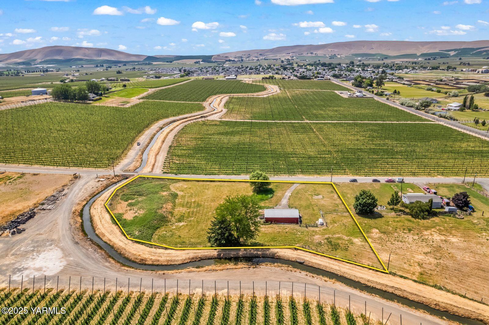 9031 Duffield Road Moxee, WA 98936 - Photo 14 of 19 an aerial view of a house with a ocean view