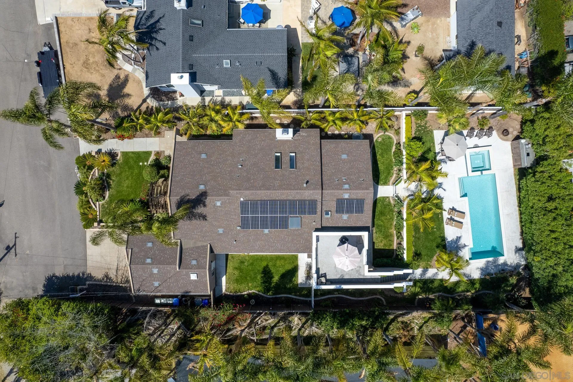 1269 Rainbow Ridge Lane Encinitas, CA 92024 - Photo 26 of 27 an aerial view of a house with a yard