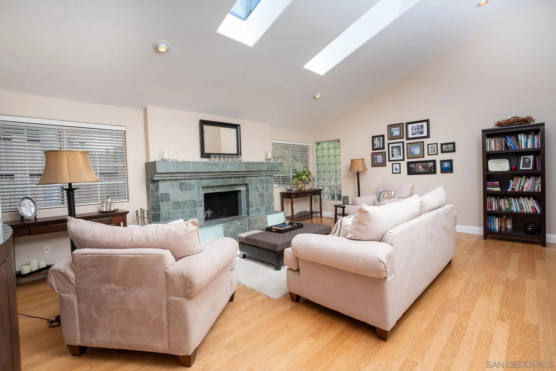 1269 Rainbow Ridge Lane Encinitas, CA 92024 - Photo 5 of 27 a living room with furniture and a fireplace