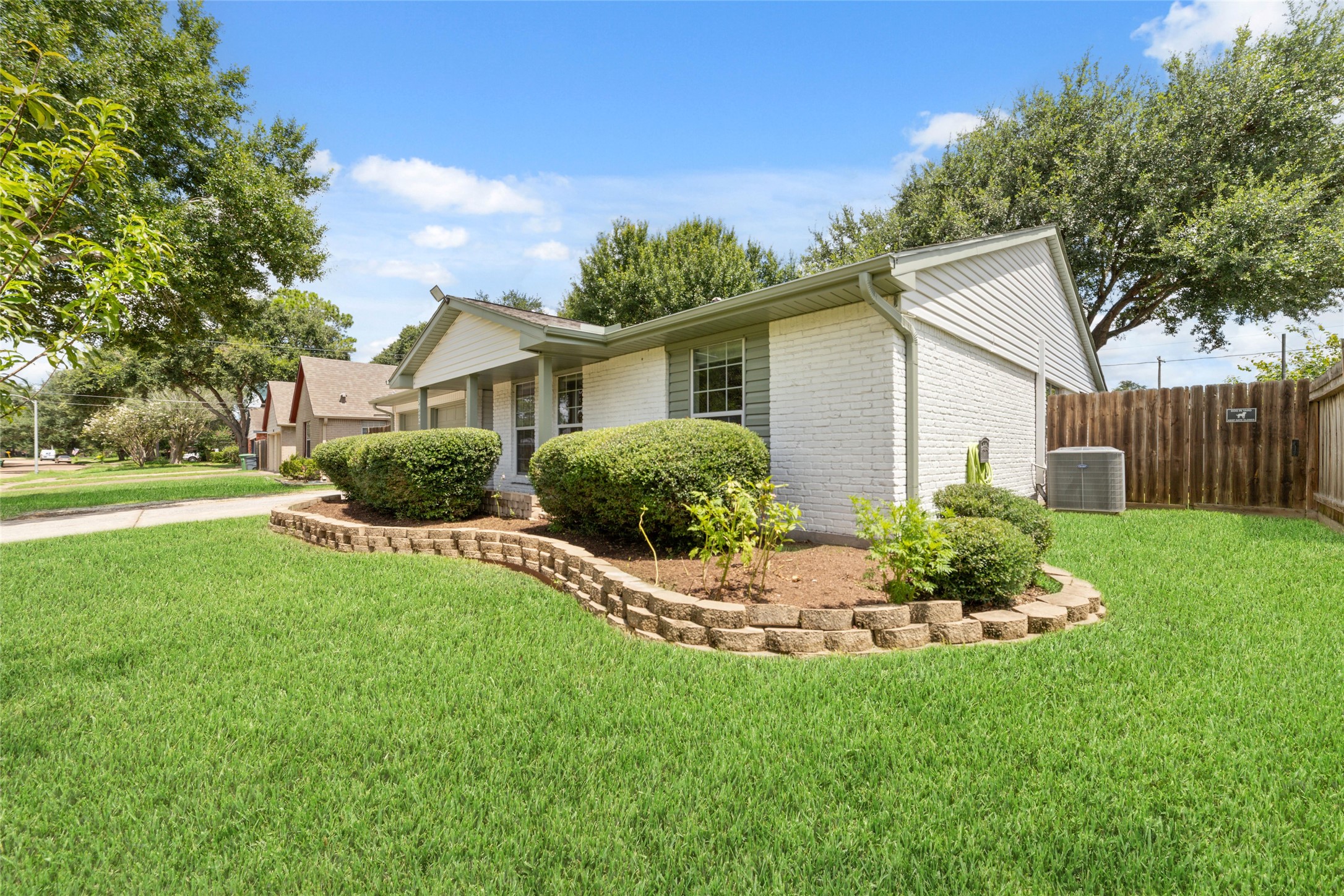 5922 Hummingbird Street Houston, TX 77096 - Photo 2 of 26 Fresh exterior paint, a recent roof, and double-pane windows create a polished first impression before you even step inside. The oversized lot gives this home room to breathe, something buyers continue to seek in Westbury.