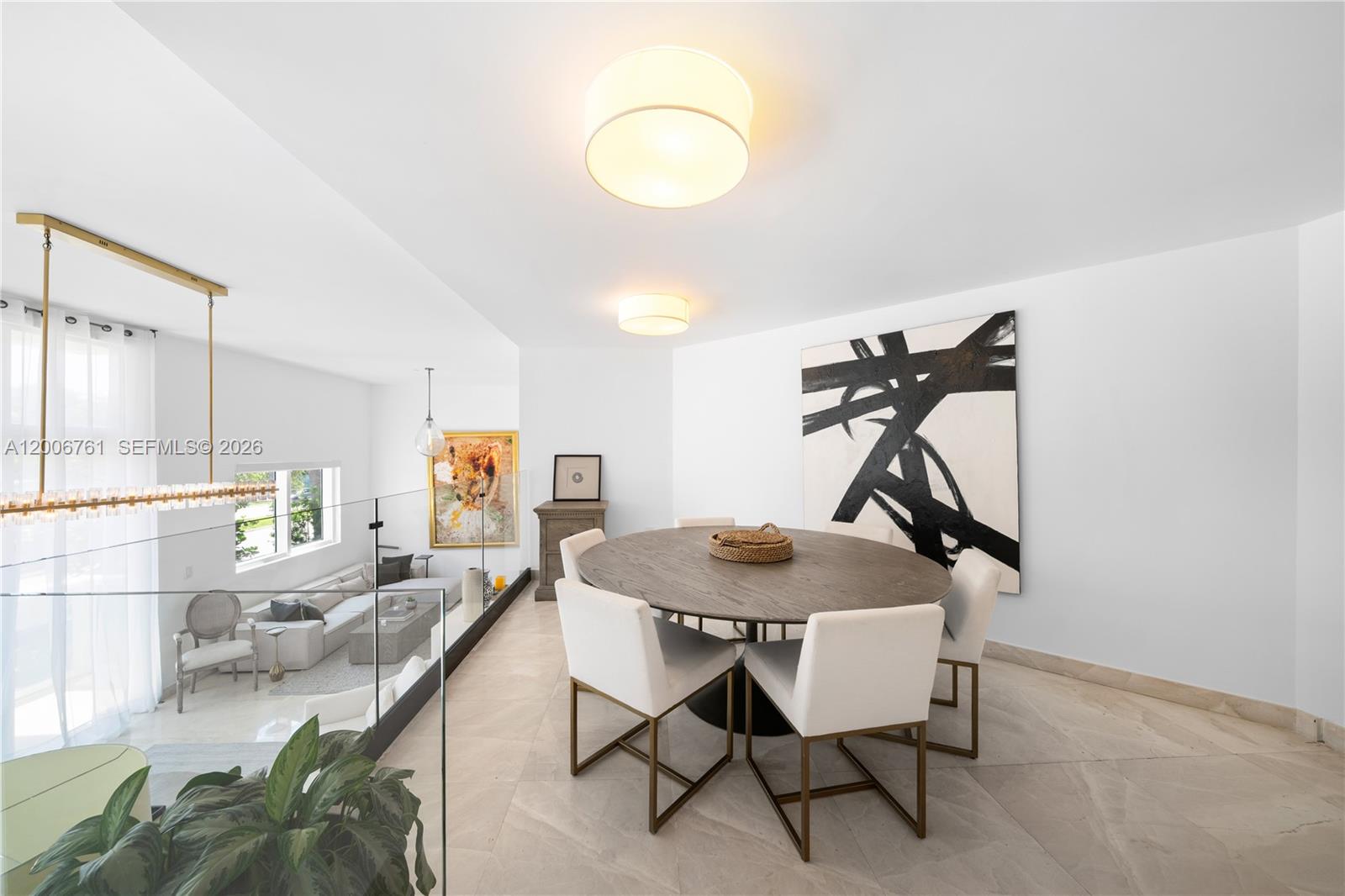 400 Alton Road, Unit TH1A Miami Beach, FL 33139 - Photo 9 of 32 a view of a dining room and livingroom