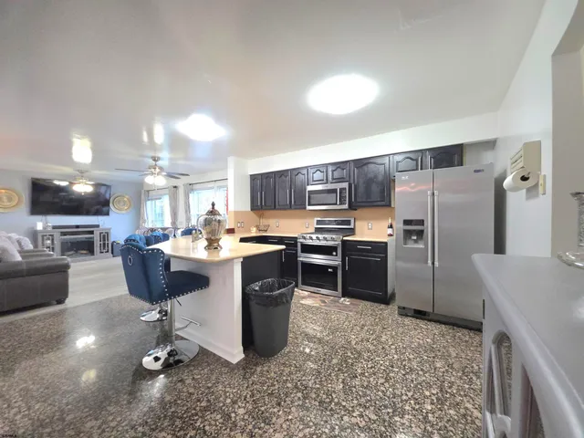 a kitchen with a stove and a sink