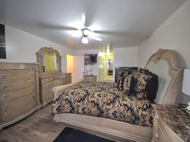 a bathroom with a sink and shower