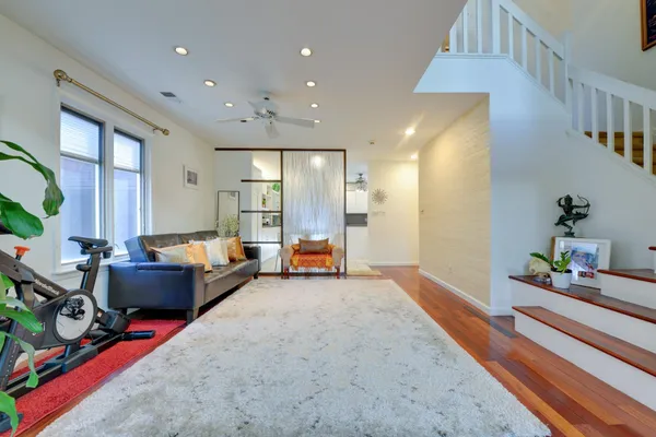 a living room with furniture and a table