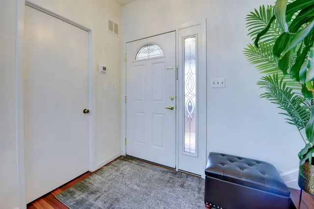 a view of room with window and trees
