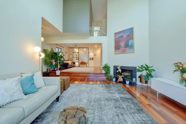 a living room with furniture and a couch