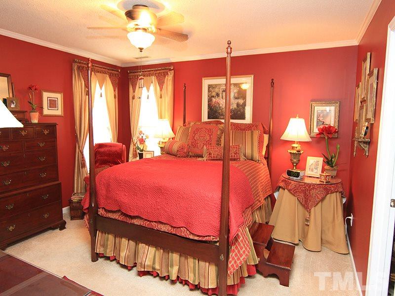 5121 Silverdene Street Raleigh, NC 27616 - Photo 6 of 12 a bedroom with a bed and window