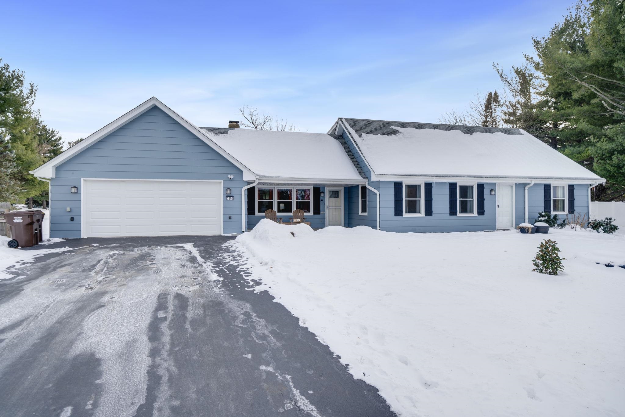 a house with trees in the background