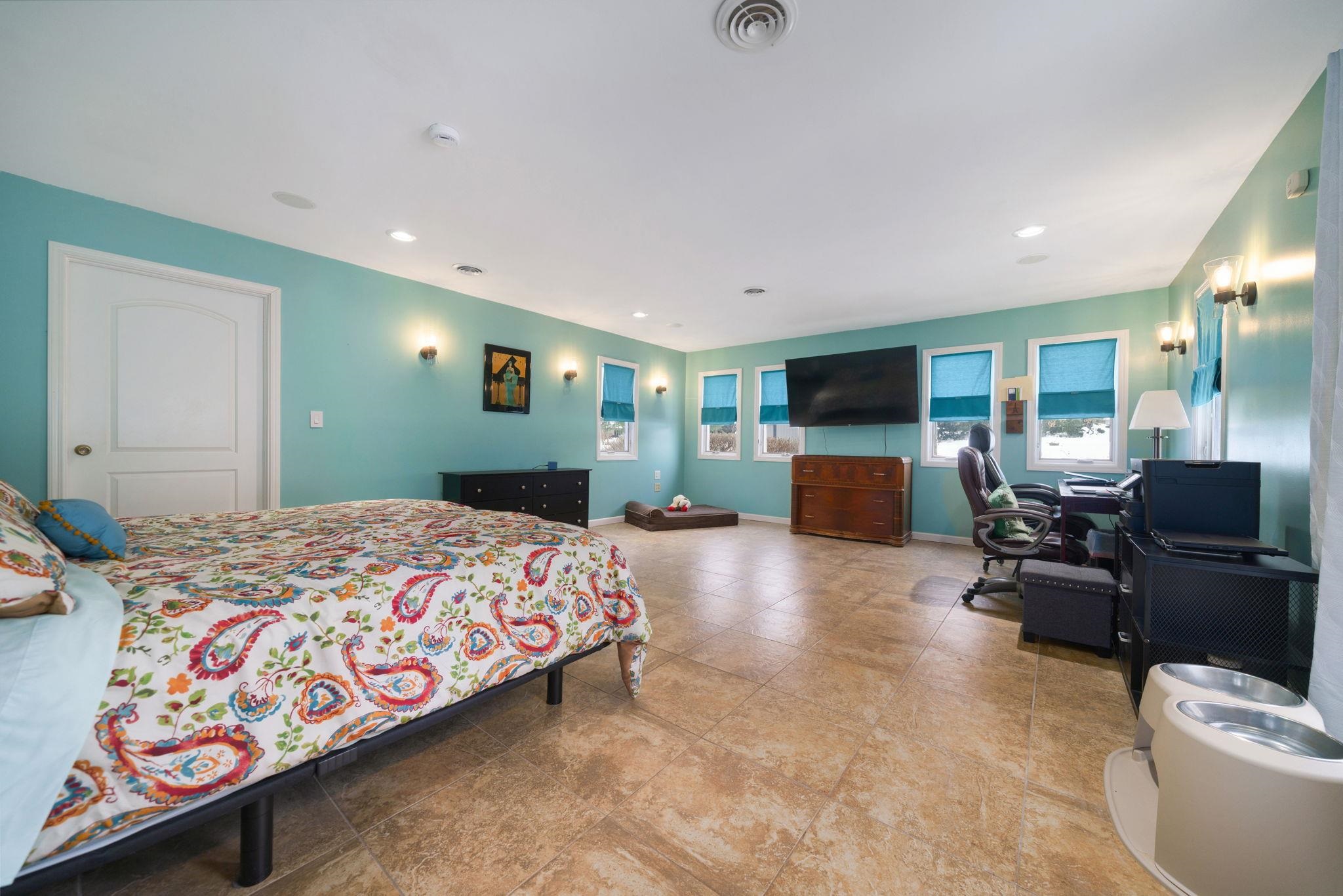 5393 Lakecrest Road Caledonia, IL 61011 - Photo 19 of 40 a bedroom with a bed and furniture