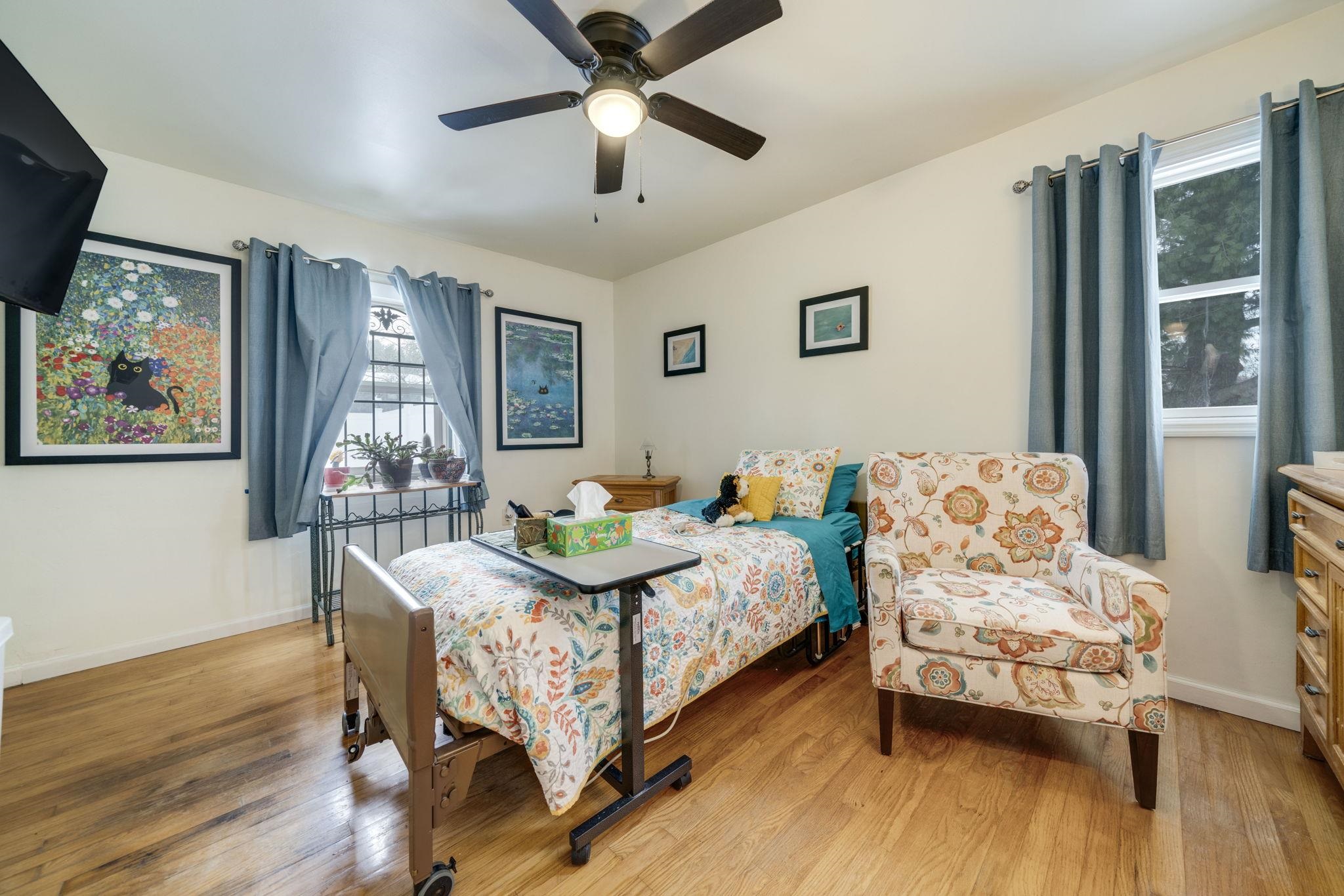 5393 Lakecrest Road Caledonia, IL 61011 - Photo 24 of 40 a bedroom with a bed and wooden floor