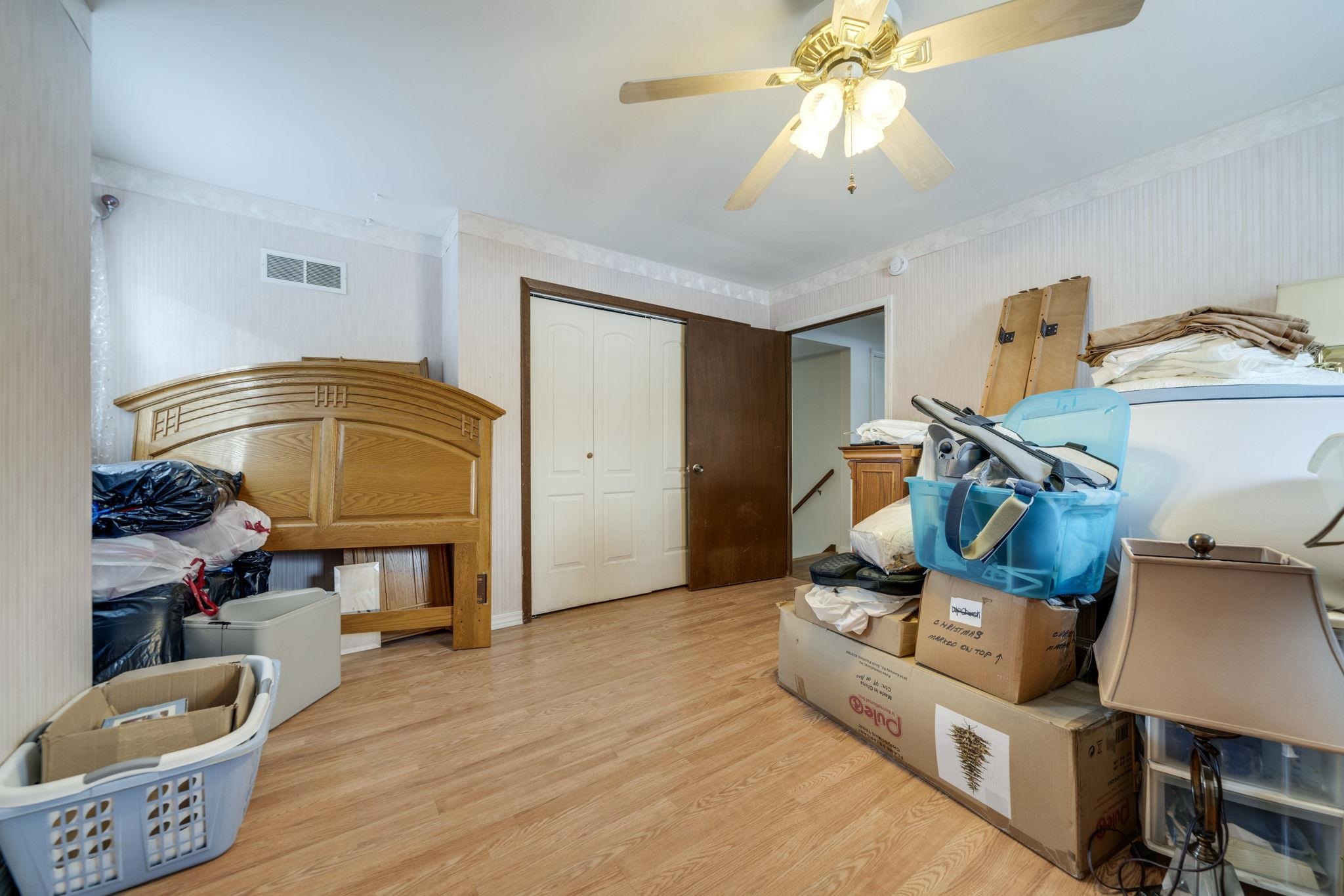 5393 Lakecrest Road Caledonia, IL 61011 - Photo 27 of 40 a living room with furniture and a chandelier