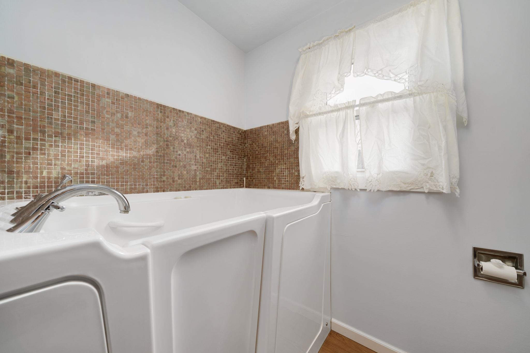 5393 Lakecrest Road Caledonia, IL 61011 - Photo 31 of 40 a bathroom with a sink and a mirror