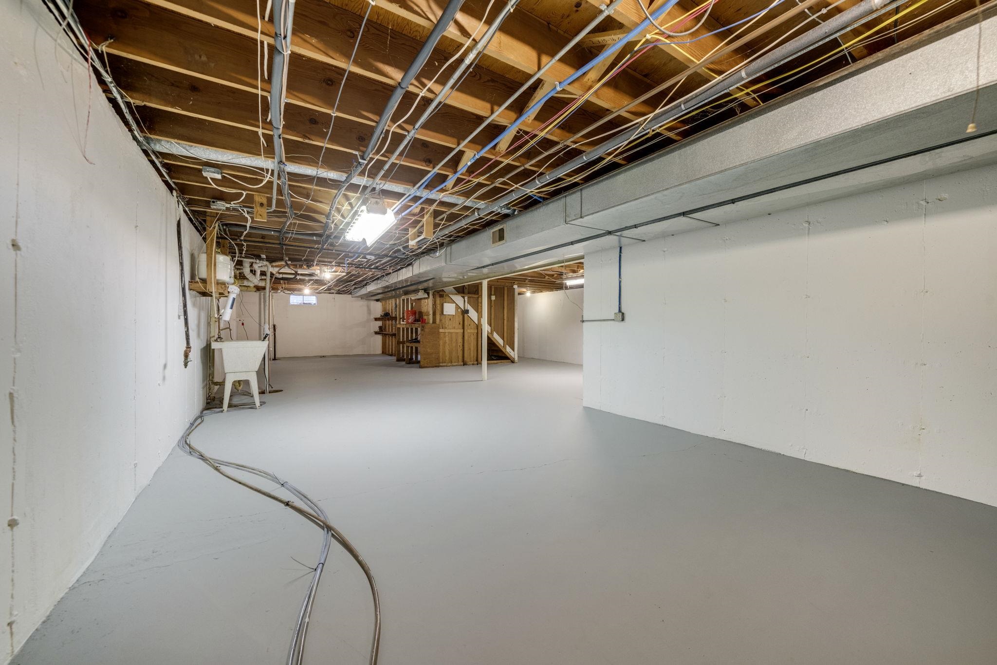 5393 Lakecrest Road Caledonia, IL 61011 - Photo 35 of 40 a view of storage and utility room with stairs