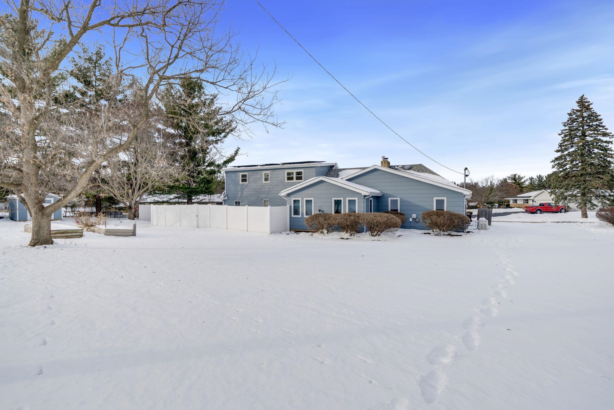 5393 Lakecrest Road Caledonia, IL 61011 - Photo 39 of 40 a car parked beside a road next to a building
