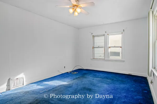 a view of cabinets and wooden floor