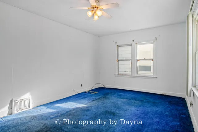 a view of cabinets and wooden floor
