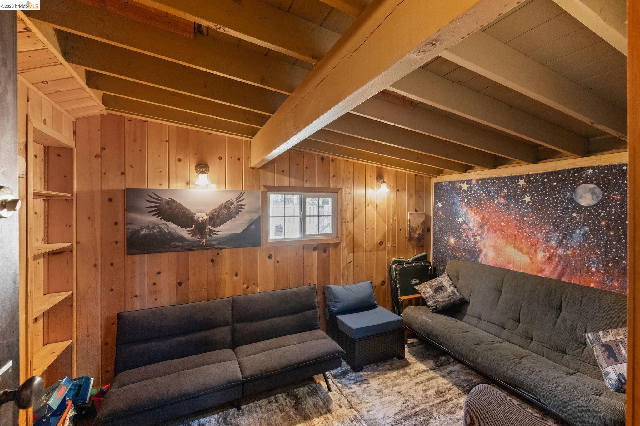 26175 Janice Way Long Barn, CA 95335 - Photo 11 of 23 Bonus Space with vaulted ceiling with beams and wooden walls