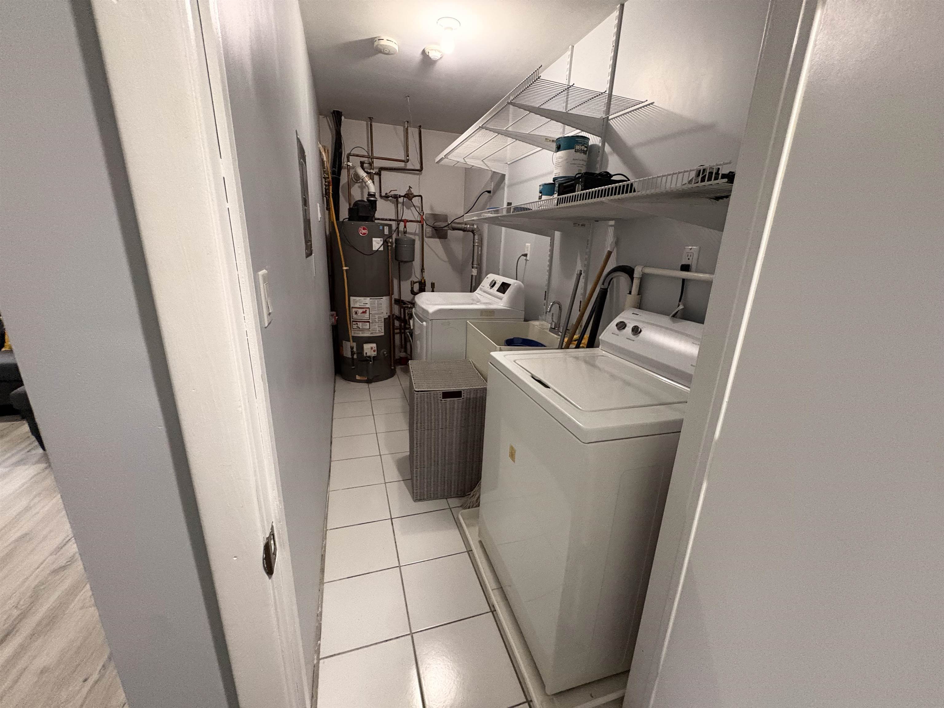 32 Franklin Street, Unit 2 Hackensack, NJ 07601 - Photo 11 of 13 a view of storage and utility room with washer and dryer