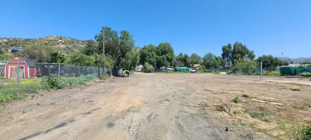 a backyard of a house with trees