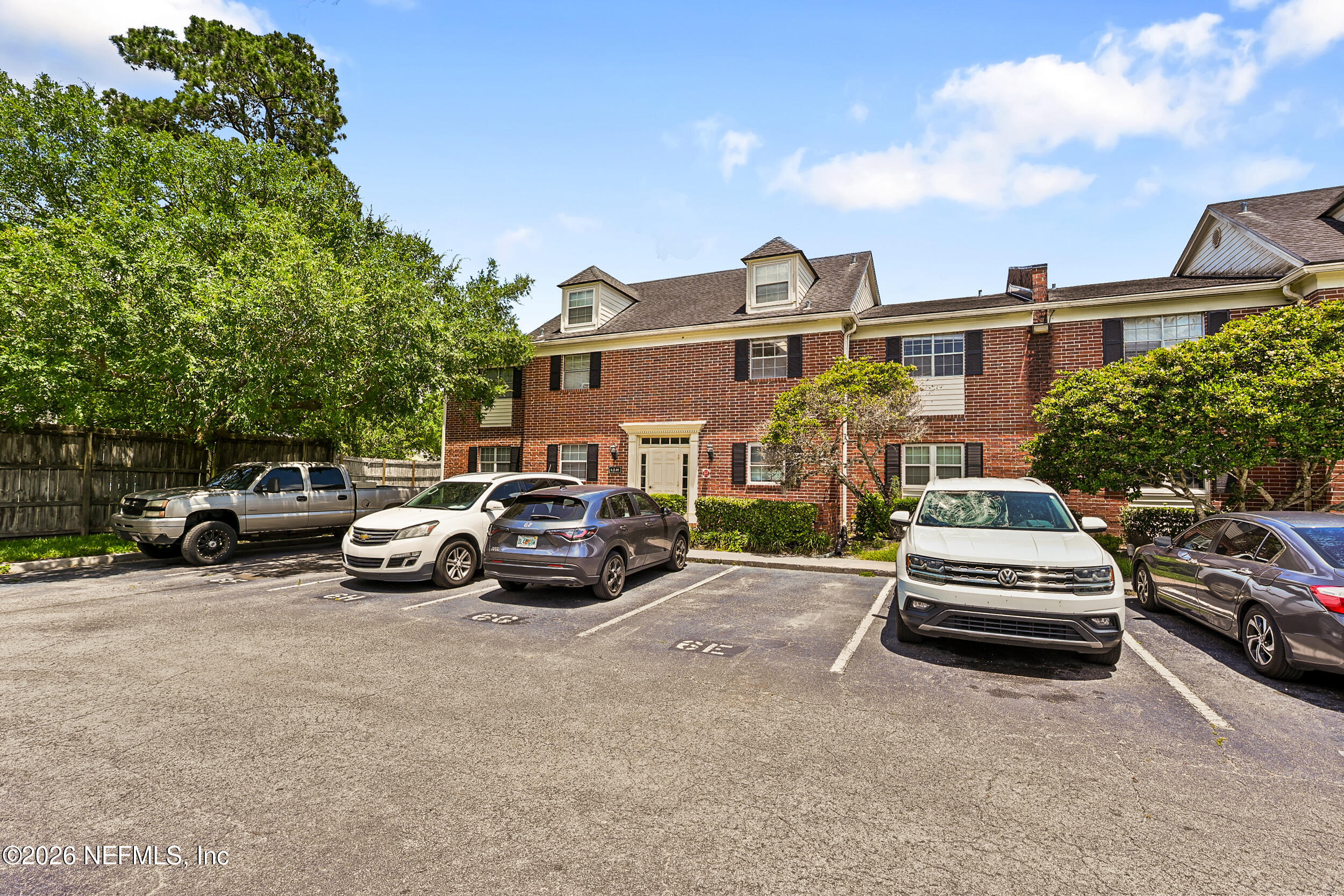 4915 Baymeadows Road, Unit 6G Jacksonville, FL 32217 - Photo 3 of 44 a view of a car parked in front of a house