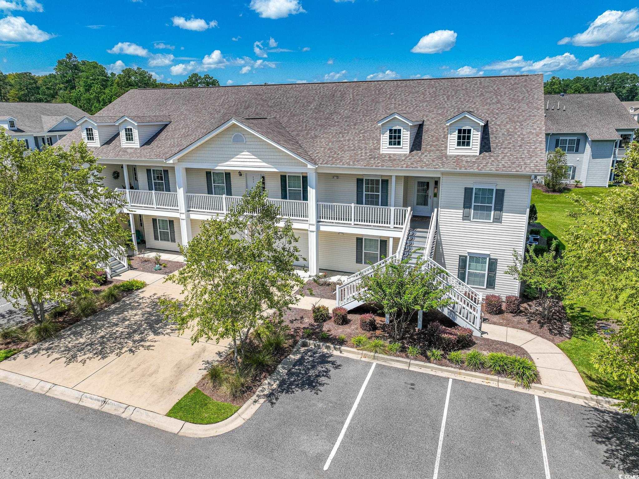 828 Sail Lane, Unit 203 Murrells Inlet, SC 29576 - Photo 1 of 26 Townhome / multi-family property with a balcony