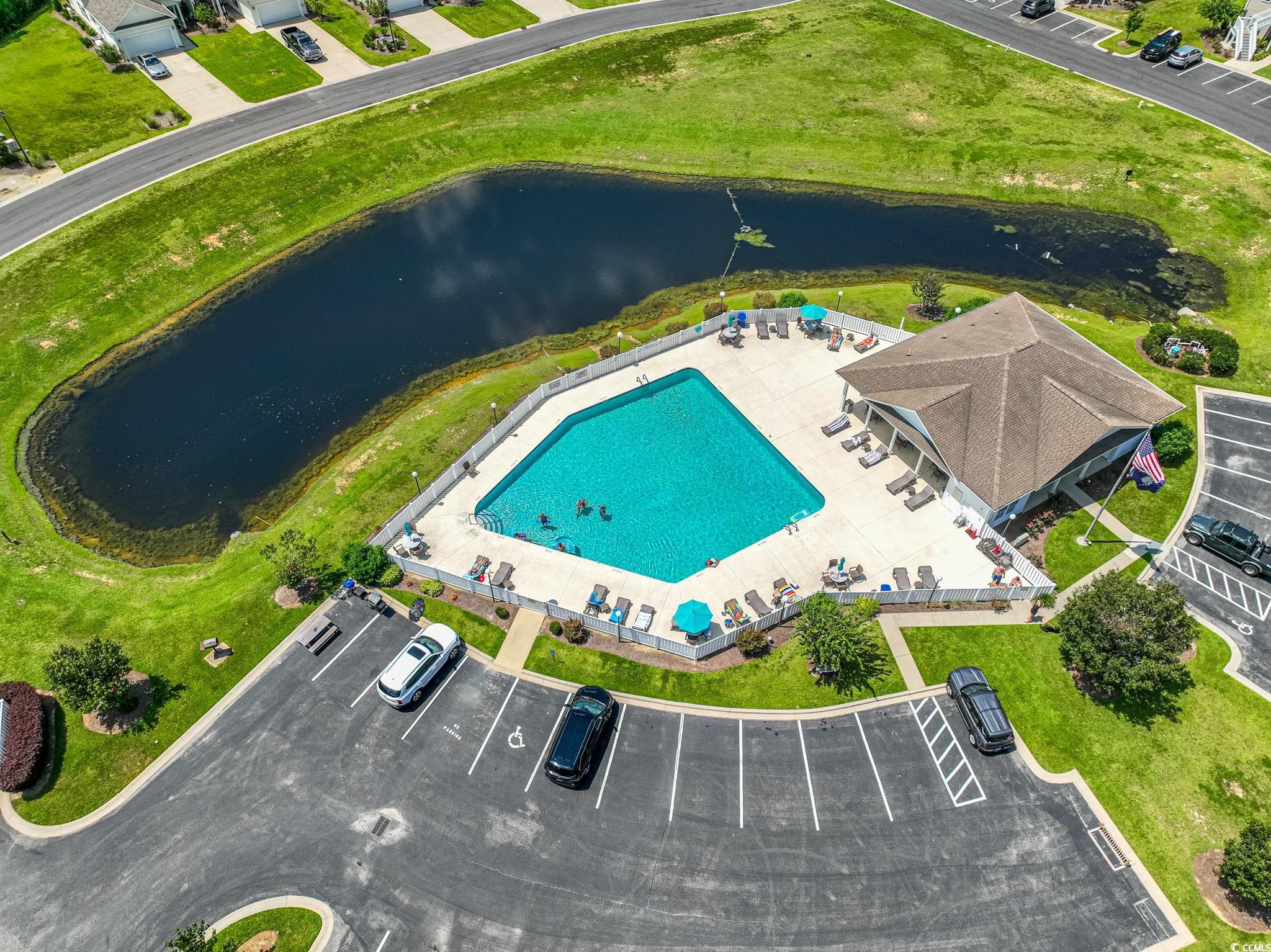 828 Sail Lane, Unit 203 Murrells Inlet, SC 29576 - Photo 3 of 26 Drone / aerial view featuring a water view