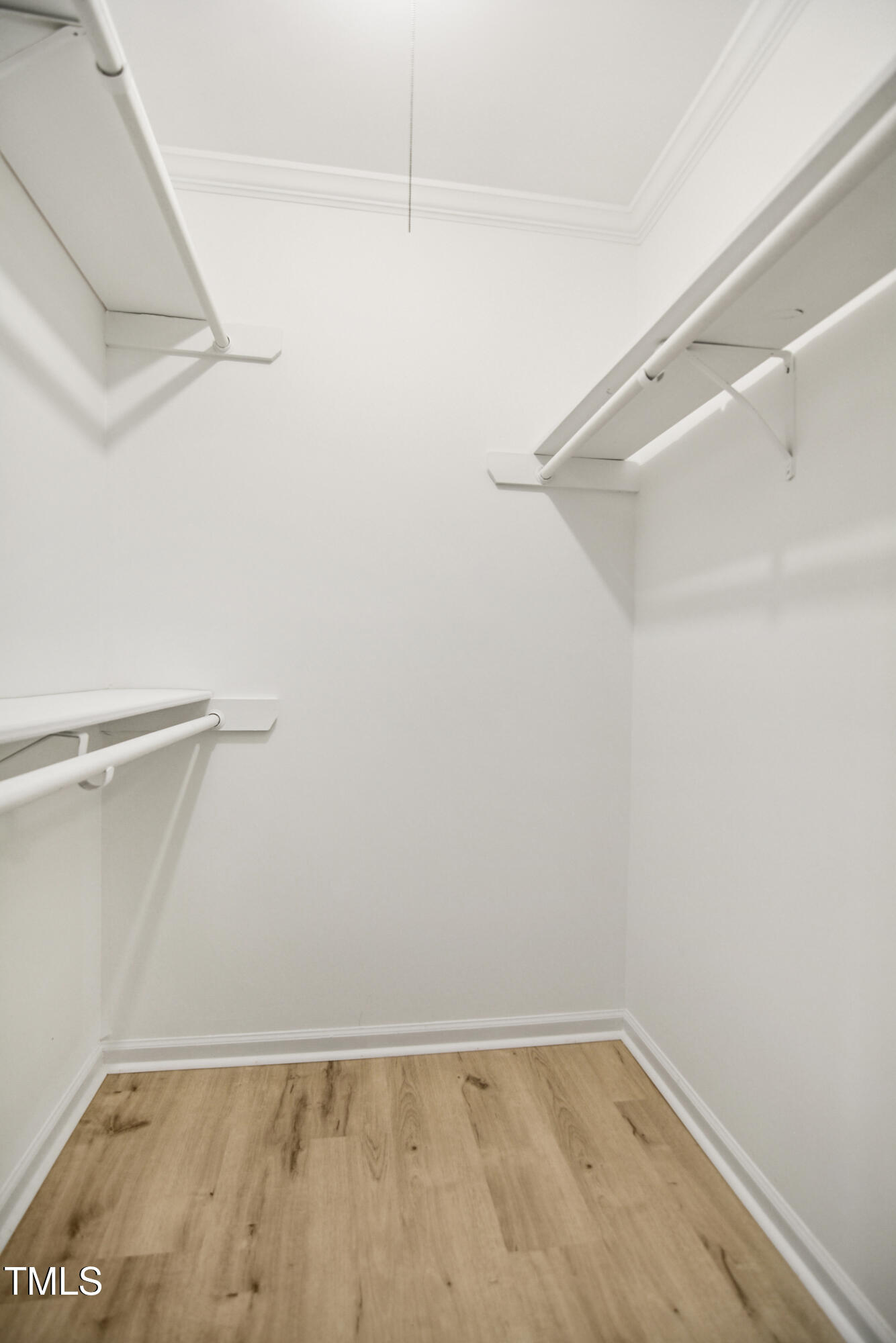 5436 Sharpe Drive Raleigh, NC 27612 - Photo 11 of 18 a view of an empty walk in closet