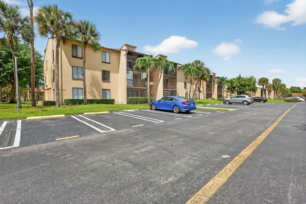 a cars parked in front of a building