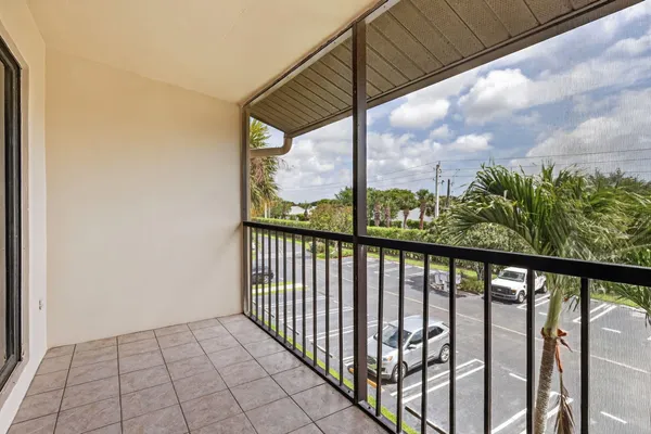 a view of a street view from a balcony