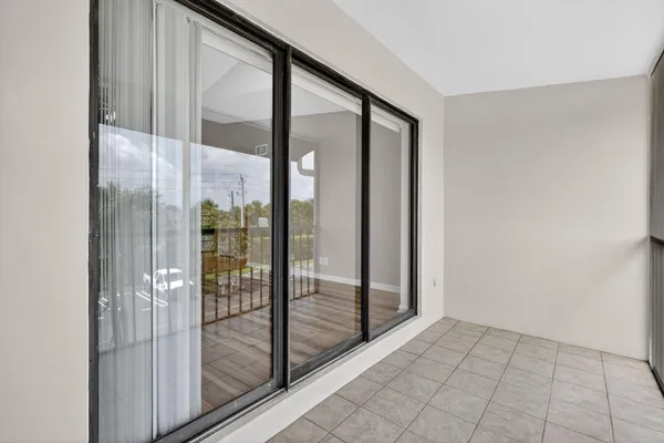 a view of an empty room and window