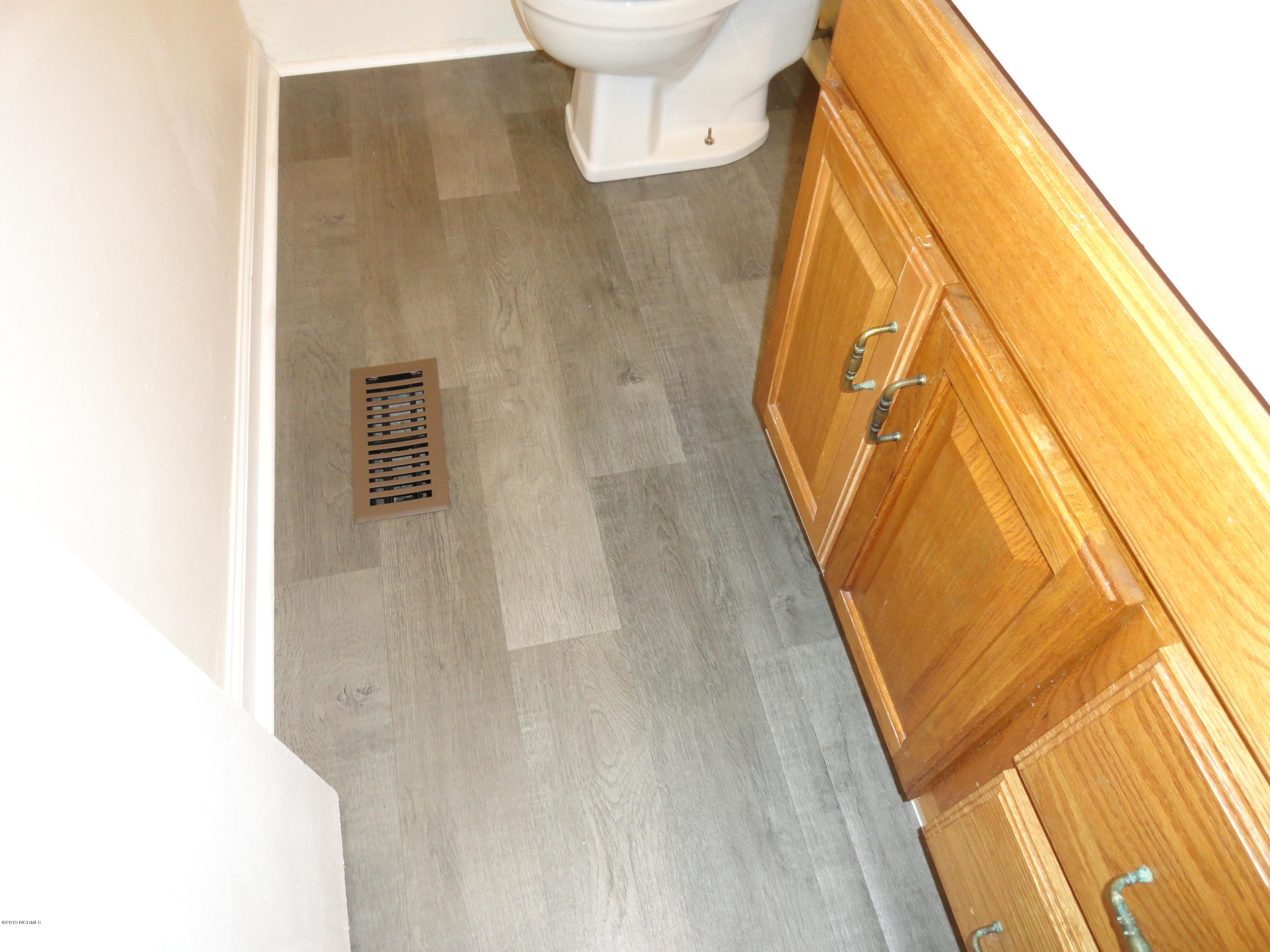 225 Nottingham Drive Havelock, NC 28532 - Photo 11 of 25 New LVP Flooring in the Owners Bath