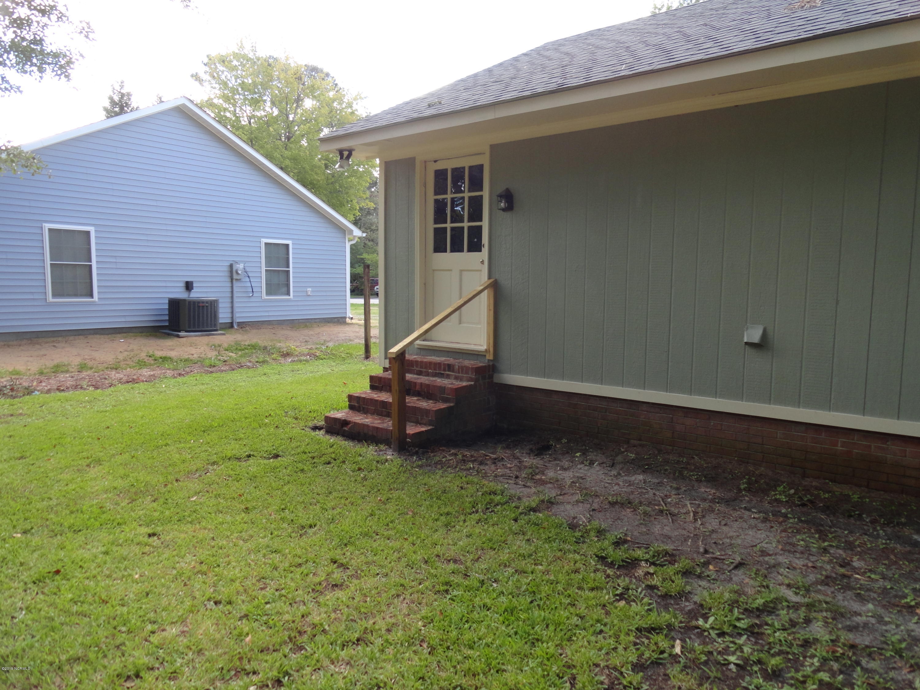 225 Nottingham Drive Havelock, NC 28532 - Photo 24 of 25 Door to Back from Laundry