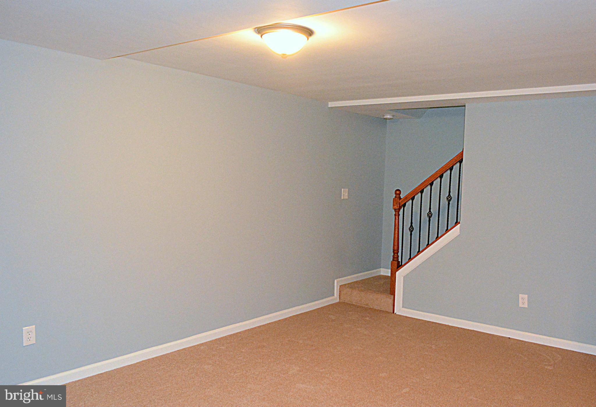 2085 Crouse Mill Road Taneytown, MD 21787 - Photo 13 of 19 a view of an empty room with stairs