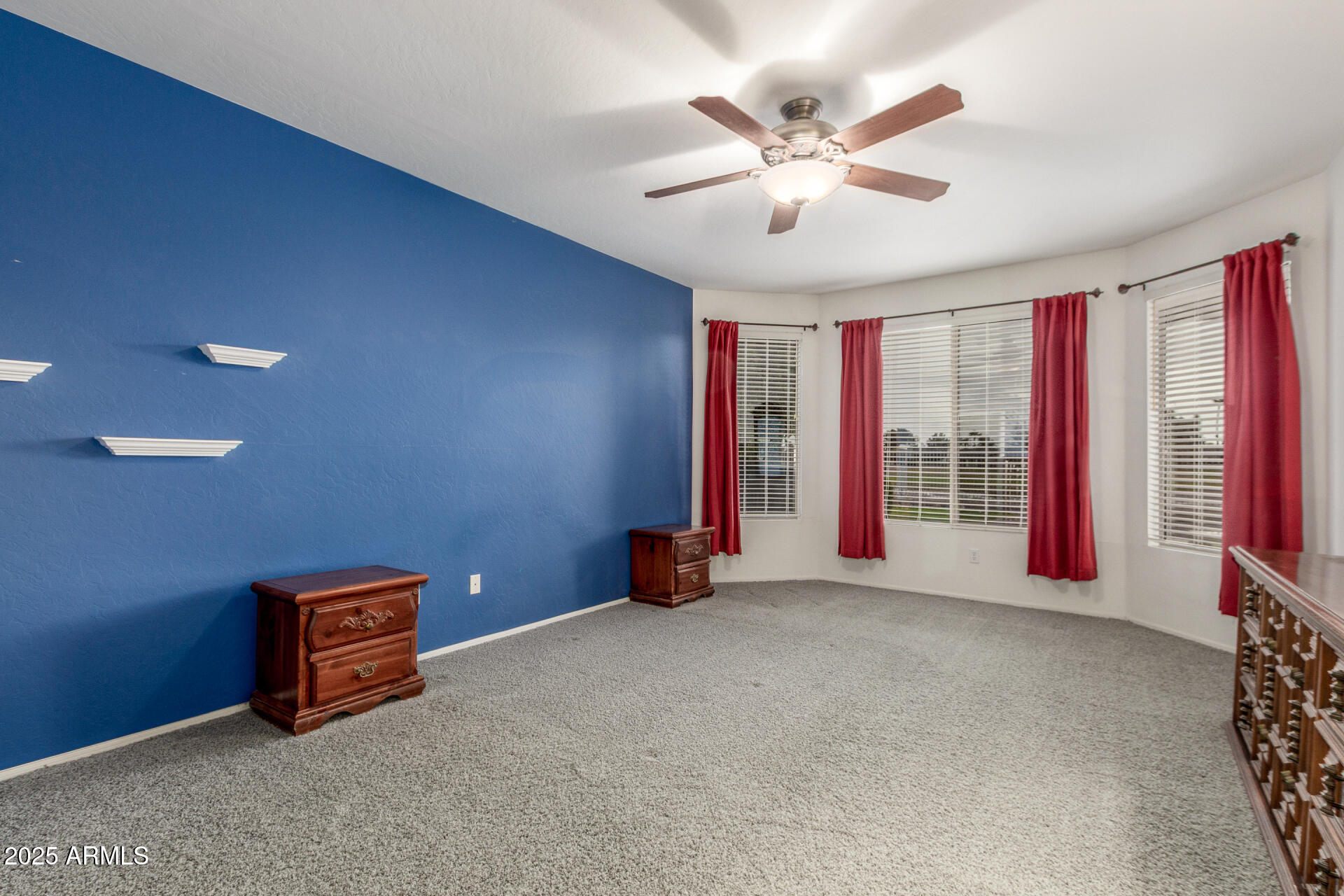 1111 South Sandstone Street Gilbert, AZ 85296 - Photo 19 of 59 an empty room with windows and fan