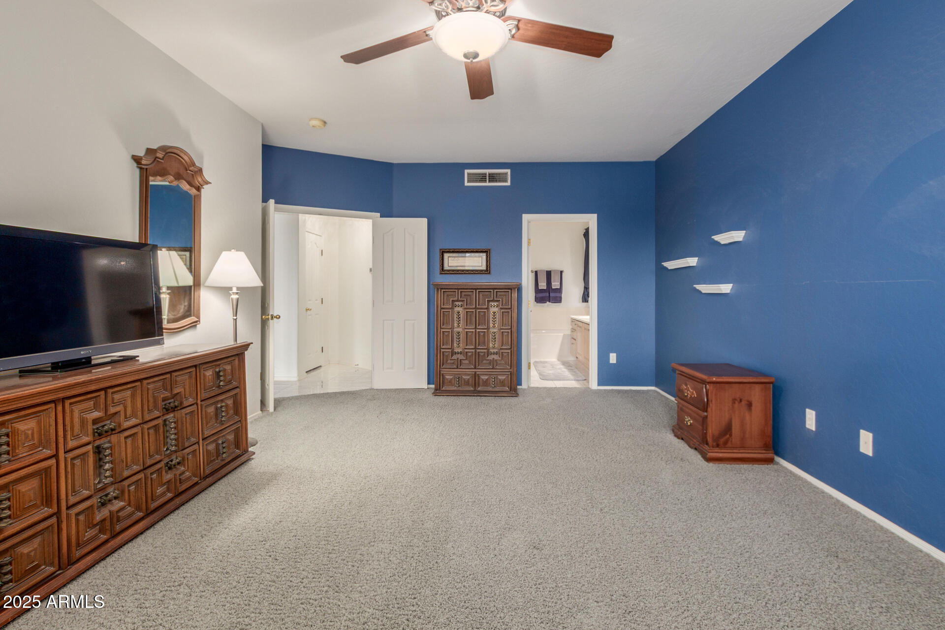 1111 South Sandstone Street Gilbert, AZ 85296 - Photo 20 of 59 a view of an empty room with window and a flat screen tv
