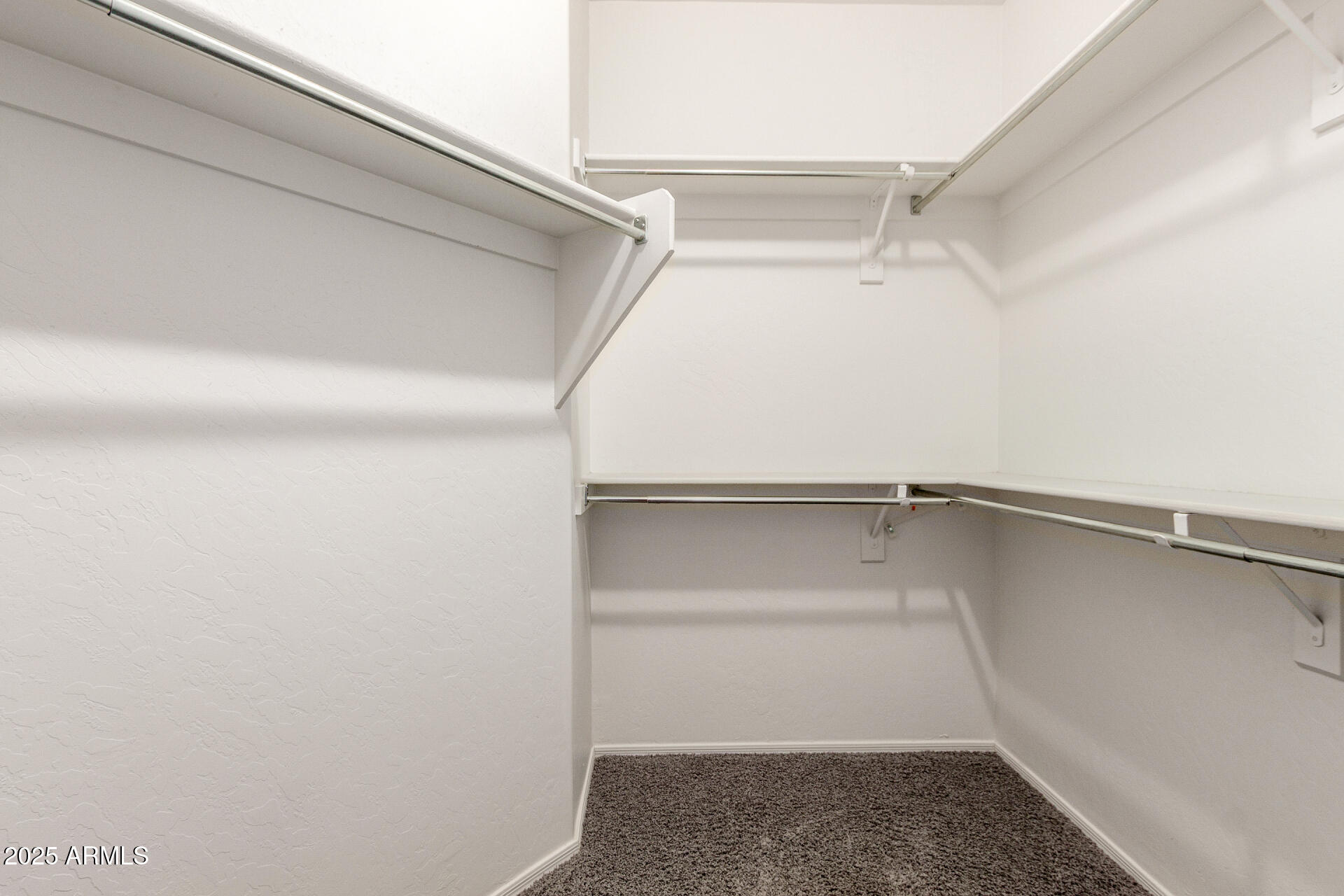 1111 South Sandstone Street Gilbert, AZ 85296 - Photo 22 of 59 a view of an empty walk in closet