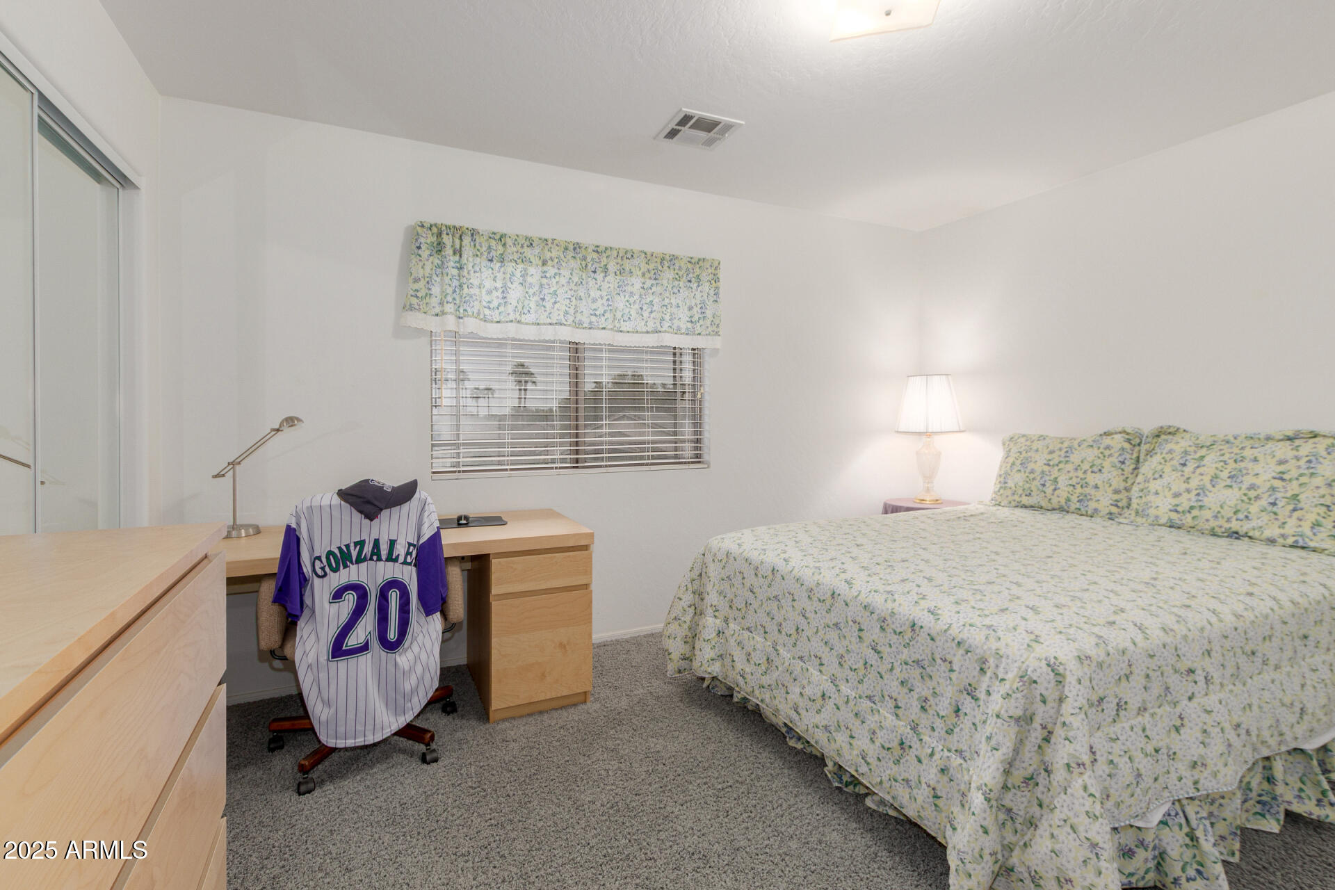 1111 South Sandstone Street Gilbert, AZ 85296 - Photo 24 of 59 a bedroom with a bed and a window
