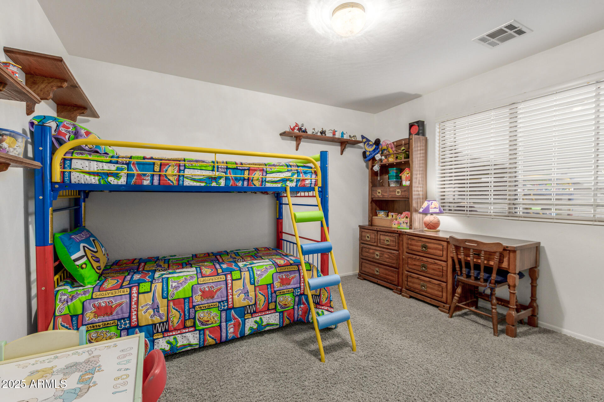 1111 South Sandstone Street Gilbert, AZ 85296 - Photo 29 of 59 a bedroom with a bed and a couch
