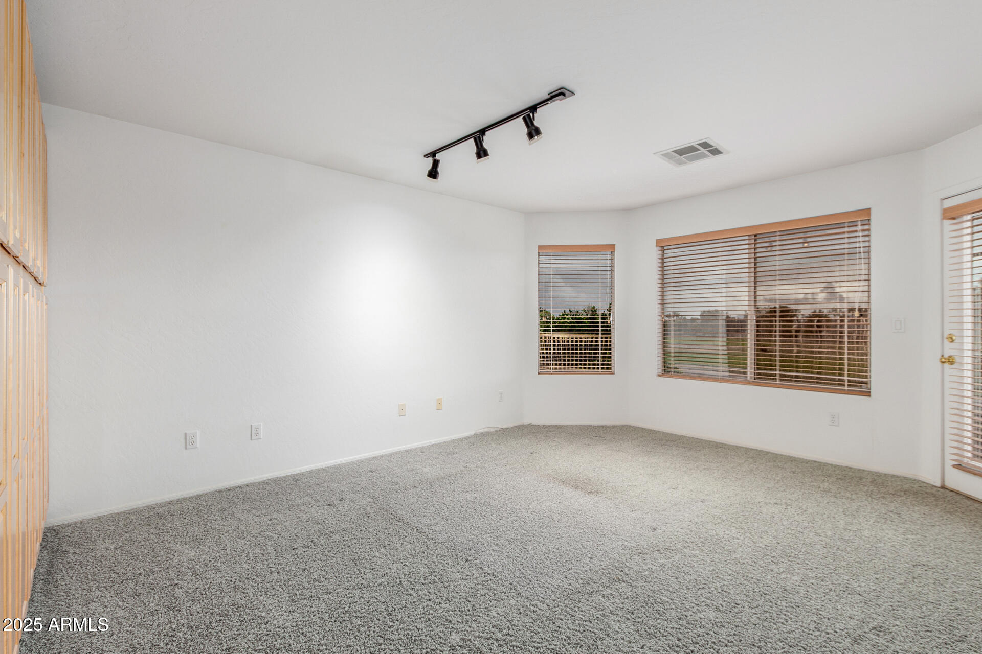 1111 South Sandstone Street Gilbert, AZ 85296 - Photo 32 of 59 an empty room with windows