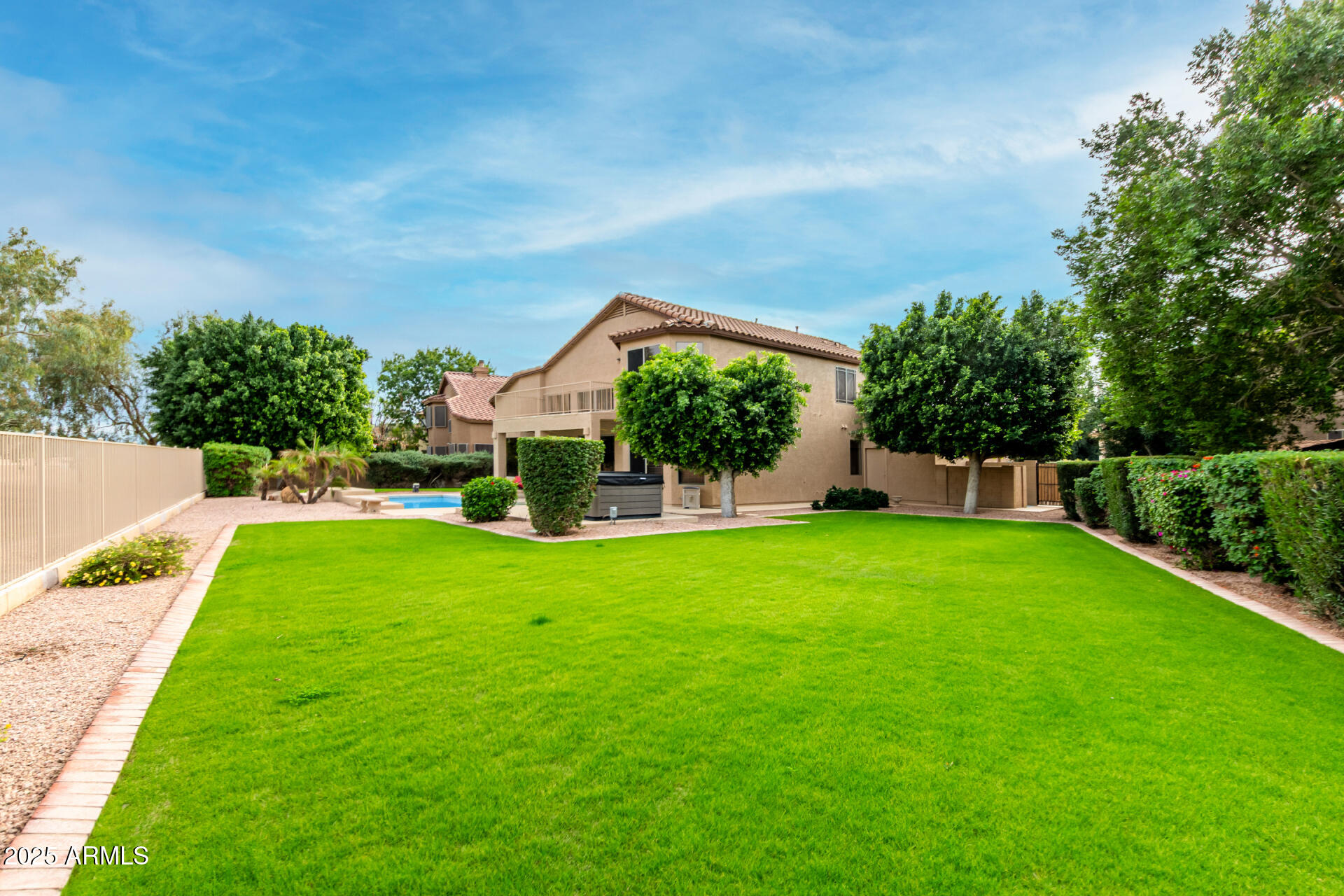 1111 South Sandstone Street Gilbert, AZ 85296 - Photo 45 of 59 a front view of a house with garden