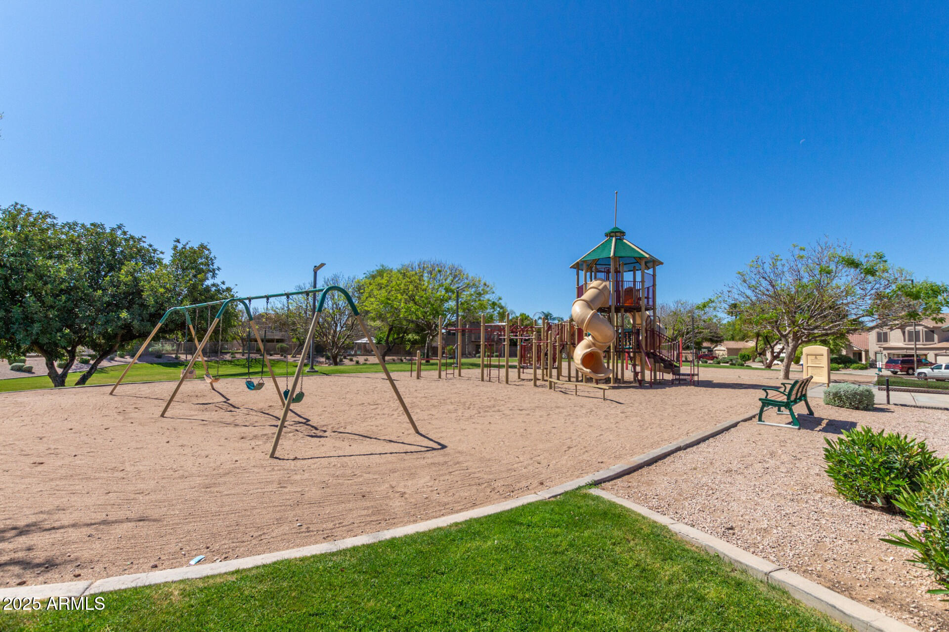 1111 South Sandstone Street Gilbert, AZ 85296 - Photo 50 of 59 a childrens park with lots of swings and slides