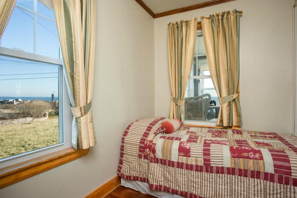 90 Fortunes Rocks Road Biddeford, ME 04005 - Photo 15 of 34 1st floor bedroom off the sun porch...