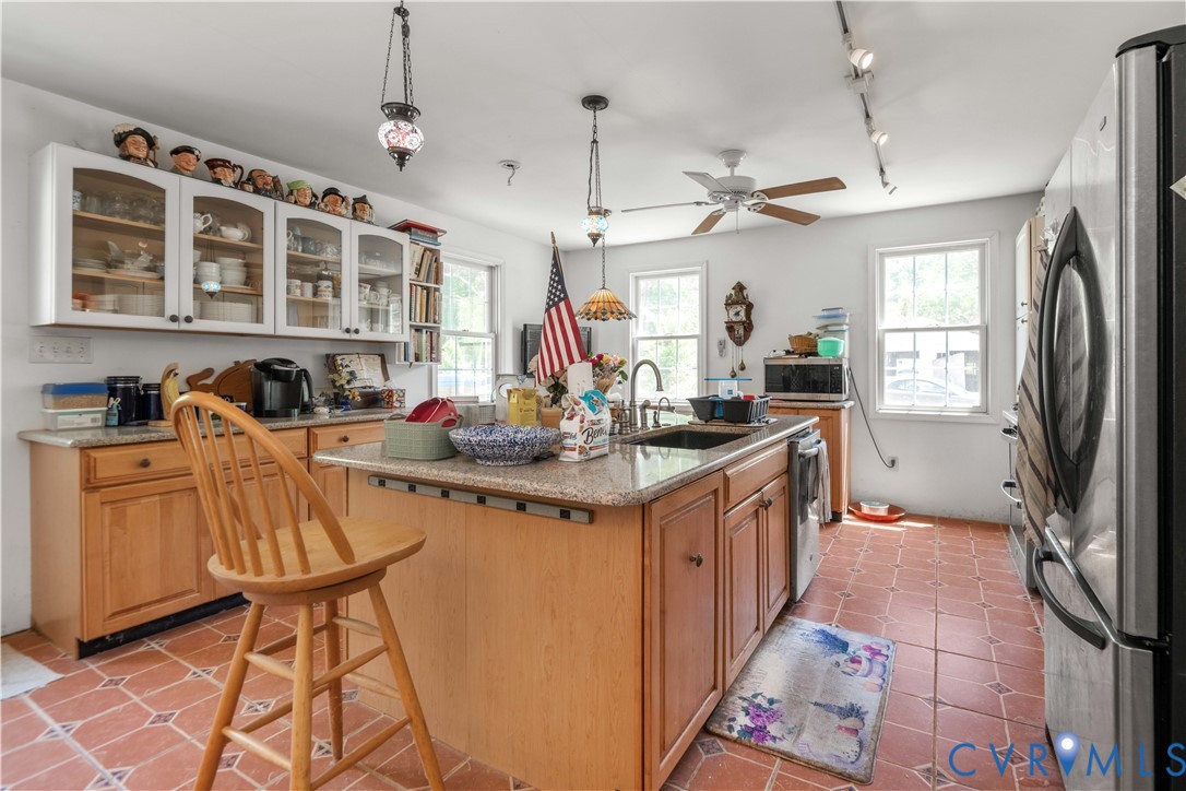 6243 Studley Road Mechanicsville, VA 23116 - Photo 28 of 65 a kitchen with stainless steel appliances granite countertop a sink and cabinets