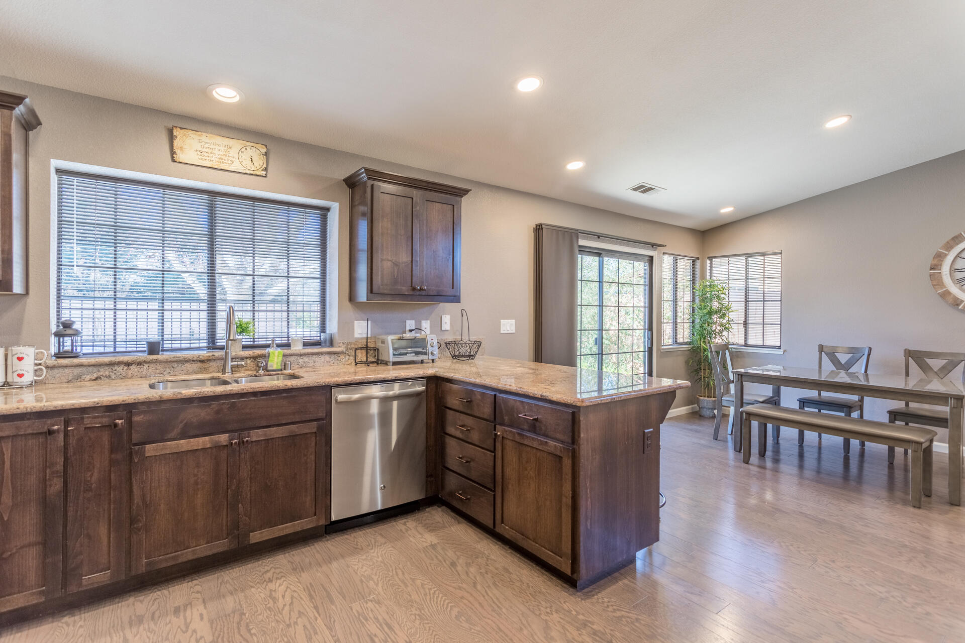6582 Hemlock Street Redding, CA 96001 - Photo 12 of 35 a large kitchen with lots of counter top space and stainless steel appliances