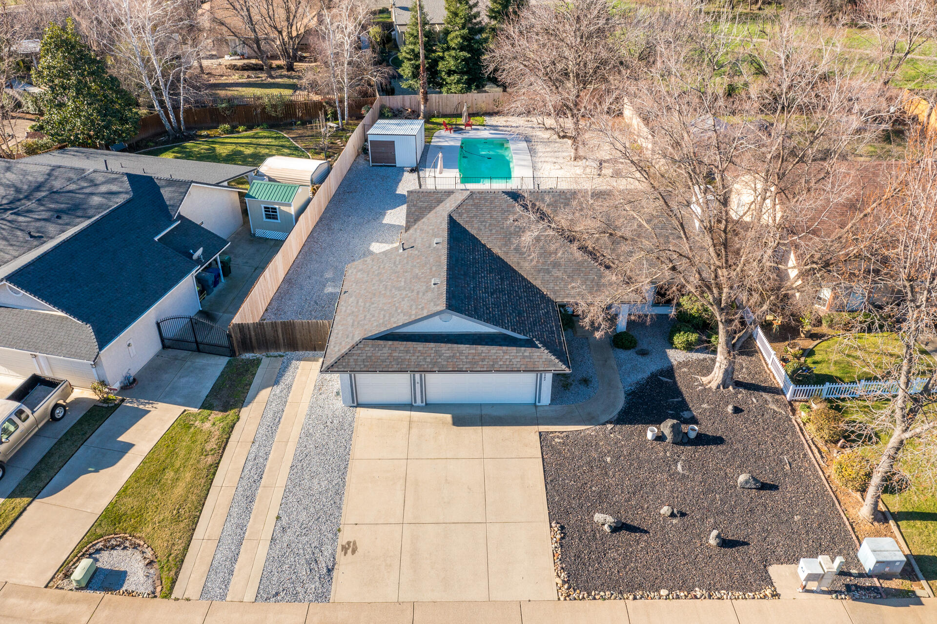 6582 Hemlock Street Redding, CA 96001 - Photo 32 of 35 a view of a house with pool