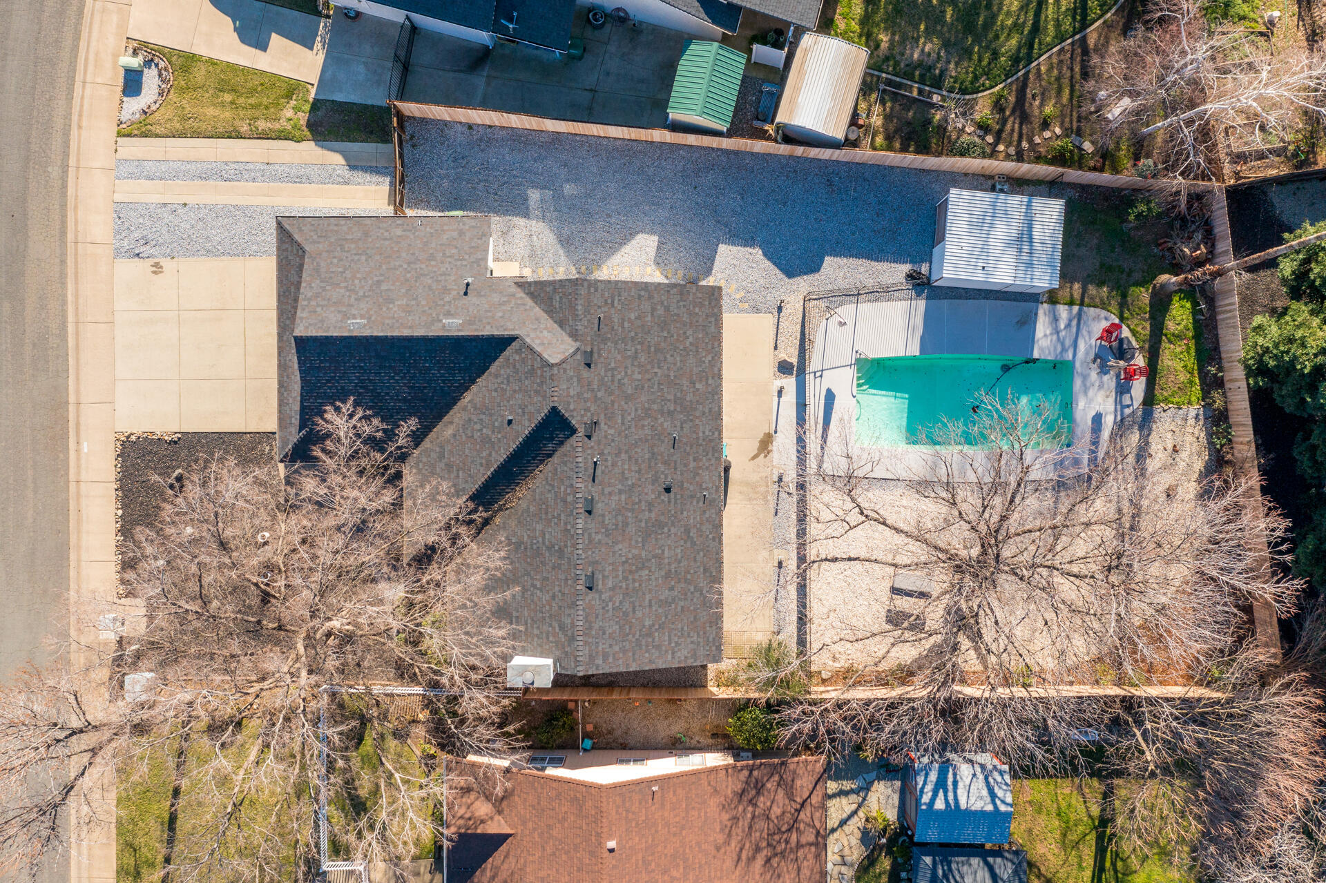 6582 Hemlock Street Redding, CA 96001 - Photo 34 of 35 a brick building with a tree in front of it