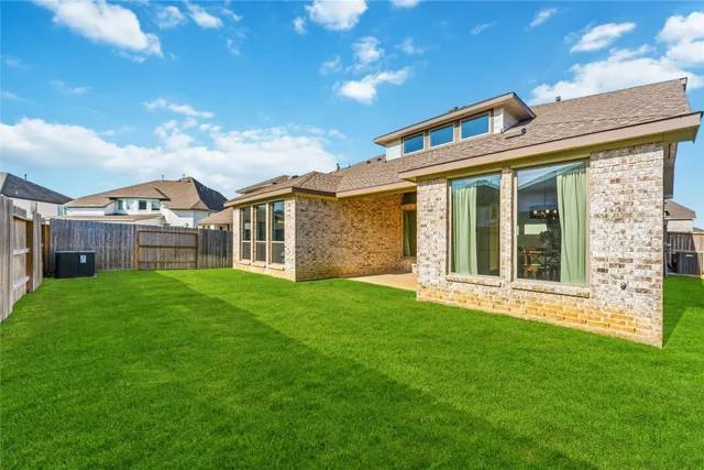 a view of a house with a garden
