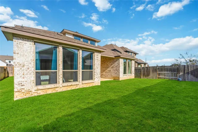 a view of a house with a garden