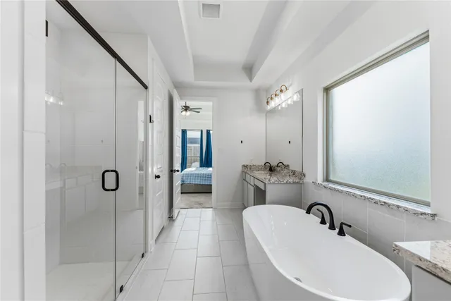 a bathroom with a sink and mirror