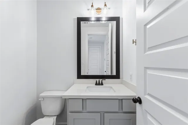 a bathroom with a sink and a toilet